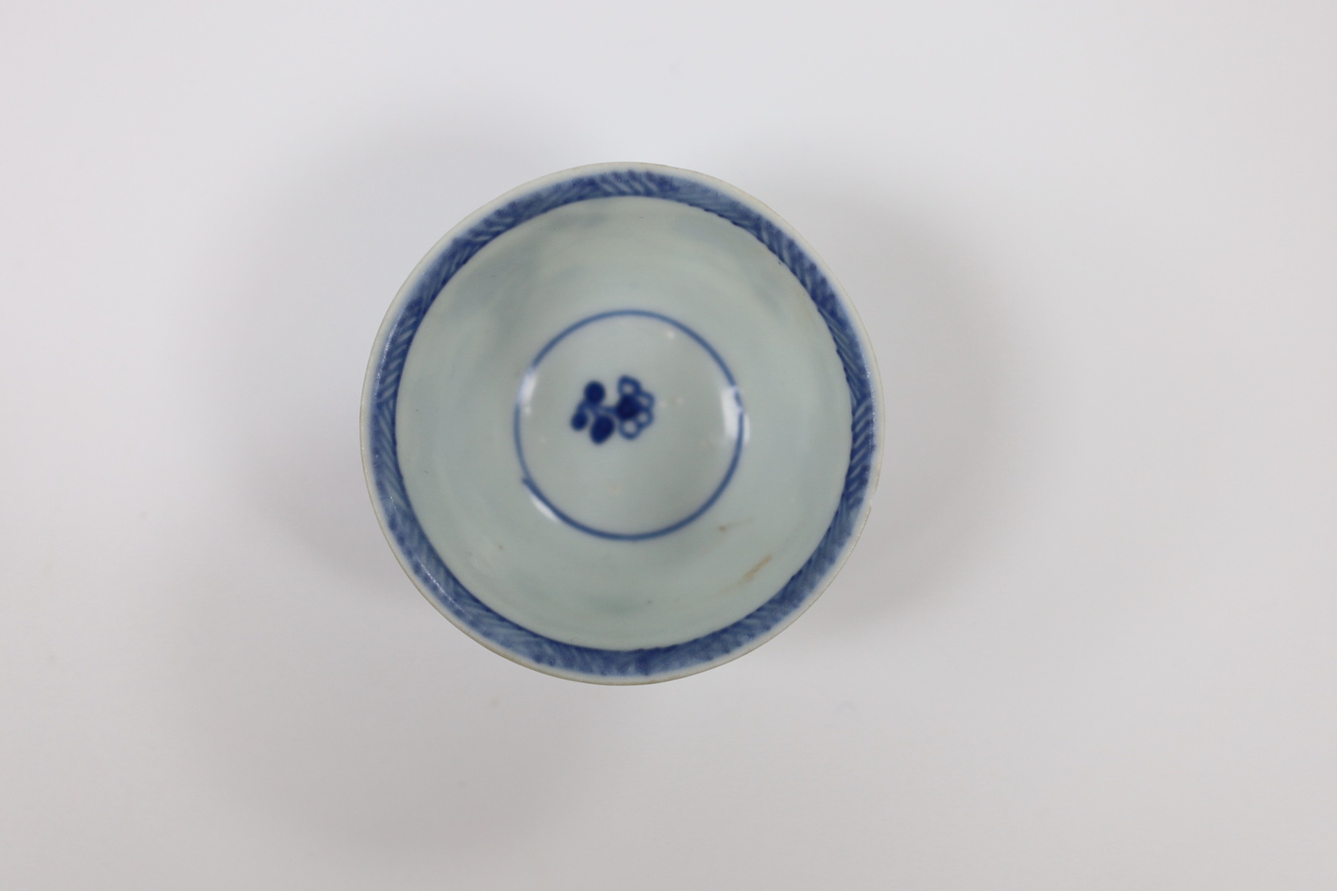 A Nanking Cargo blue and white tea bowl and saucer, 4cm tall
